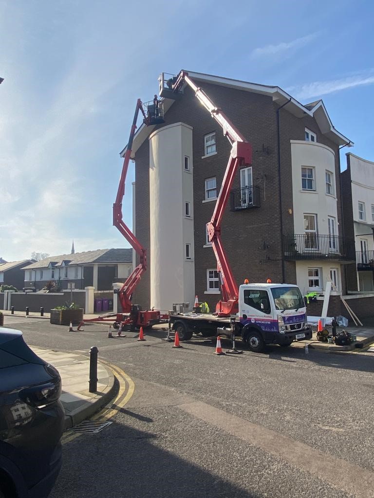 LPR access platform carrying out roof survey on residential block
